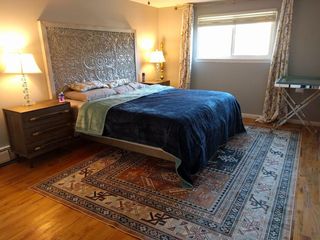 Master bedroom with his/her closets.