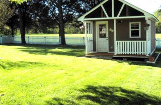 Storage shed & fenced back yard