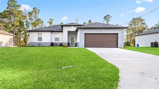 311 Mangonia Ave, Lehigh Acres, FL 33974