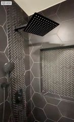 Shower with rain shower head and hand held