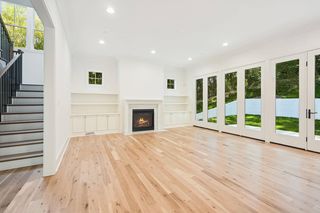 Glass doors dissolve the rear wall
