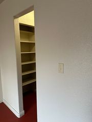 View from living room of kitchen pantry.
