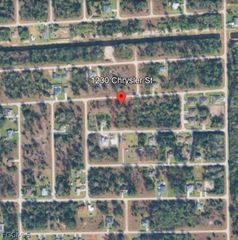 1230 Chrysler St, Lehigh Acres, FL 33974