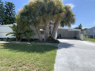 902 Midway St, Barefoot Bay, FL 32976
