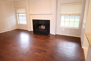 Family room. Fireplace. Plugin for your TV above the fireplace.