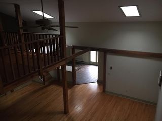 view from loft into living area