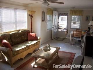 #18 Unit #1 (1st floor)
						:
						Living room showing main entrance
