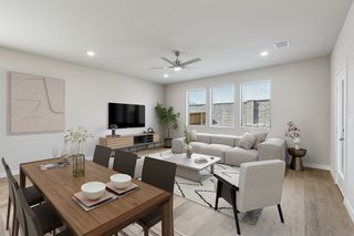 Living Room in the Holden home plan by Trophy Signature Homes - REPRESENTATIVE PHOTO