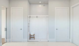 Primary bath with glass shower enclosure