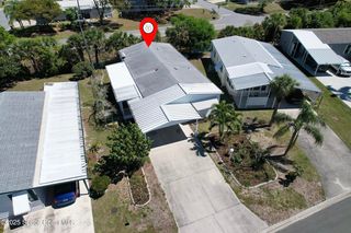 295 Papaya Cir, Barefoot Bay, FL 32976
