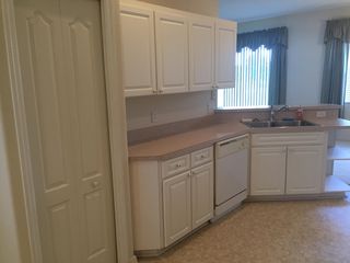 Kitchen Pantry, Dishwasher 
& Garbage Disposal.