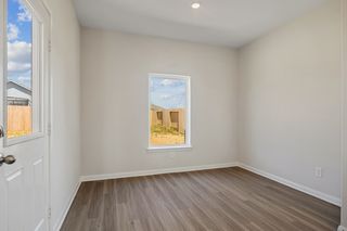 The dining room has a large window that lets in great, natural light.