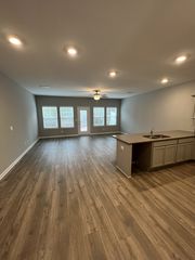 looking from the end of the foyer into the great room kitchen, very open spacious