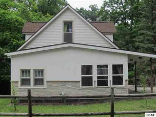 441 Cherry St, Manitou Beach, MI 49253