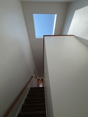 Large skylight at top of stairs