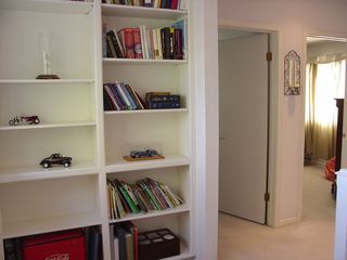 Built-in Bookshelf at top of stairs