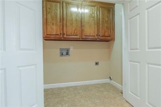 Large cabinets in the laundry to keep everything neat.