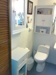Elevated toilet; cabinets