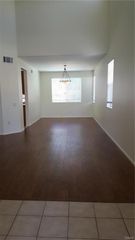 FORMAL DINING AND LIVING ROOM AREA