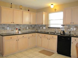 2011-New Maytag dishwasher with hidden controls. 2013 New sink, faucet and rubbed bronze cabinet hardware.