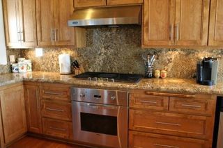 Note the granite back splash