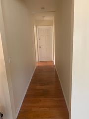 Hallway leading to bathroom.