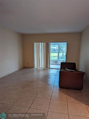 3430 NW 52nd Ave #104, Lauderdale Lakes, FL 33319