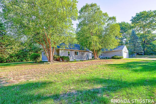 5090 Wakefield Ave NE, Comstock Park, MI 49321 MLS# 25051518