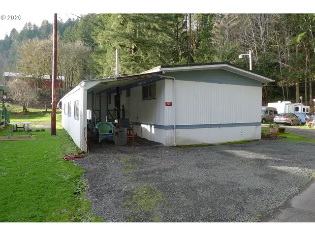 212 Woodpecker Ln, Elkton, OR 97436