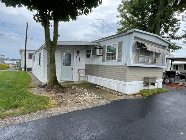 18 Fun Dr, Russells Pt, OH 43348