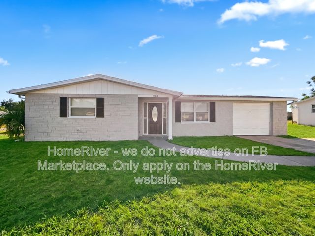12809 College Hill Dr, Hudson, FL 34667