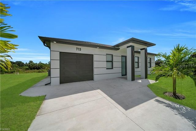 713 ROMA AVENUE S, Lehigh Acres, FL 33974