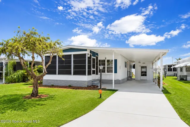1005 Thrush Cir, Barefoot Bay, FL 32976