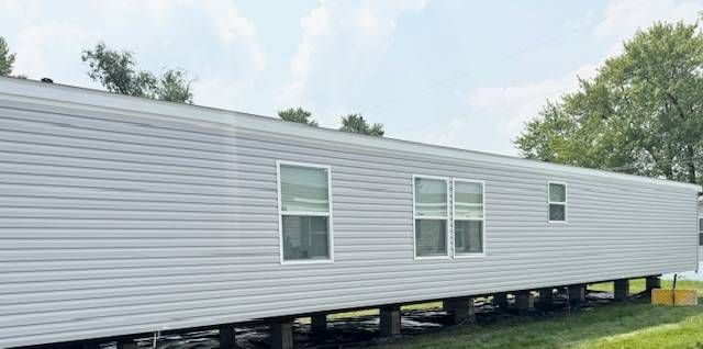 W  8th St #128, Coal Valley, IL 61240