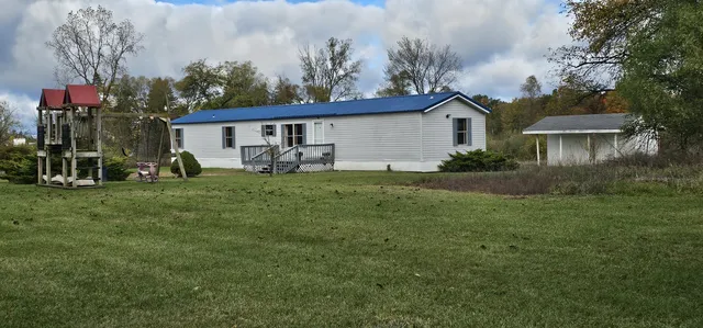 492 Belding Rd, Orleans, MI 48865