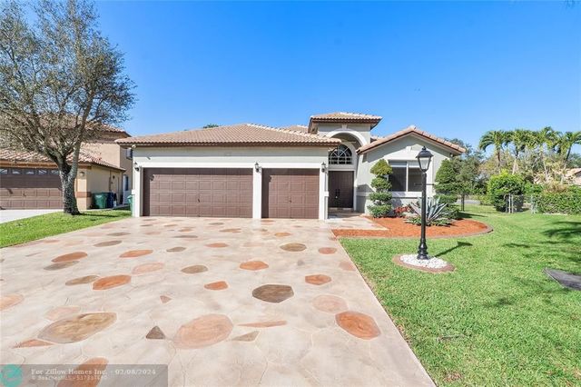 5765 NW 47th Ct, Coral Springs, FL 33067