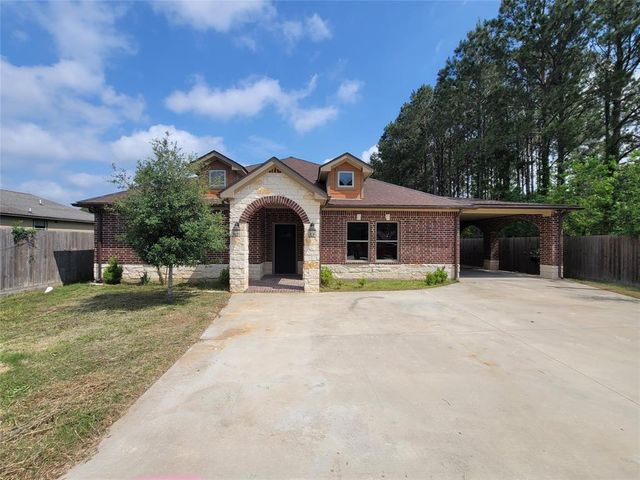 303 County Road 3479J, Cleveland, TX 77327