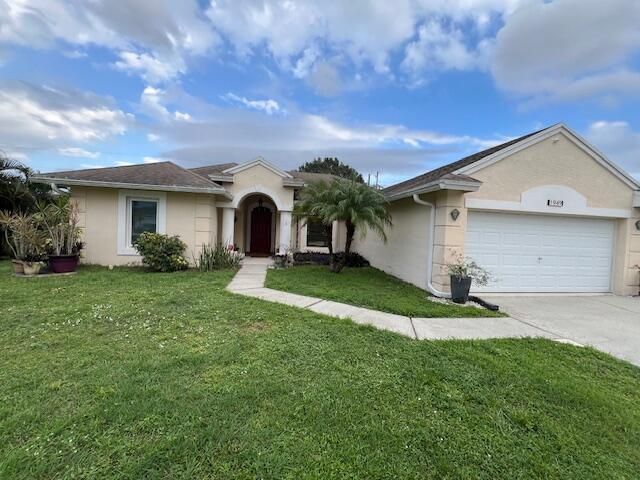 1949 SW Aguero Street, Port Saint Lucie, FL 34953