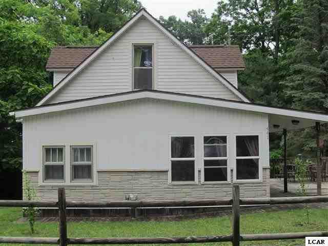 441 Cherry St, Manitou Beach, MI 49253