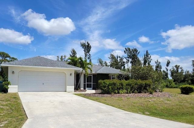 835 Whispering Pines Rd, Cape Coral, FL 33993