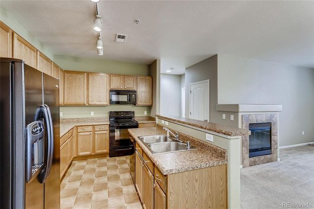 7130 Simms St #102, Arvada, CO 80004