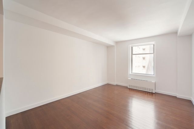 100 W  58th St #11E, New York, NY 10019