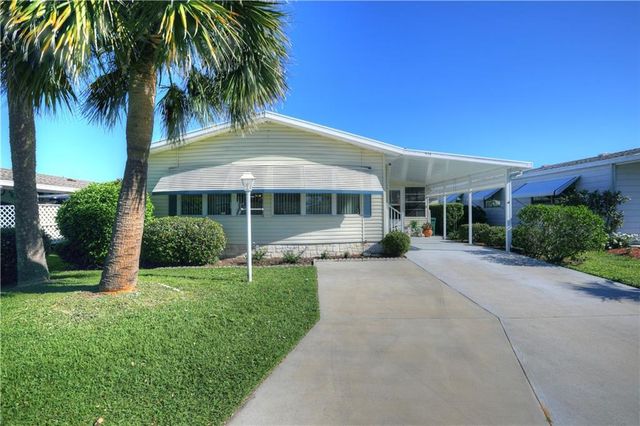 816 Hyacinth Cir, Barefoot Bay, FL 32976