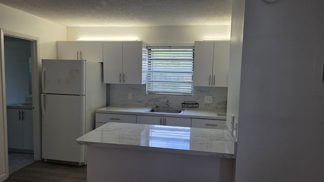 1041 SE Monterey Rd, Stuart, FL 34994