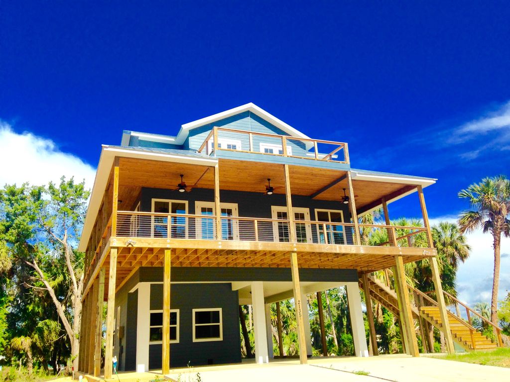 Tradewinds Model & Custome Stilt Homes Sugarmill Woods and The Nature
