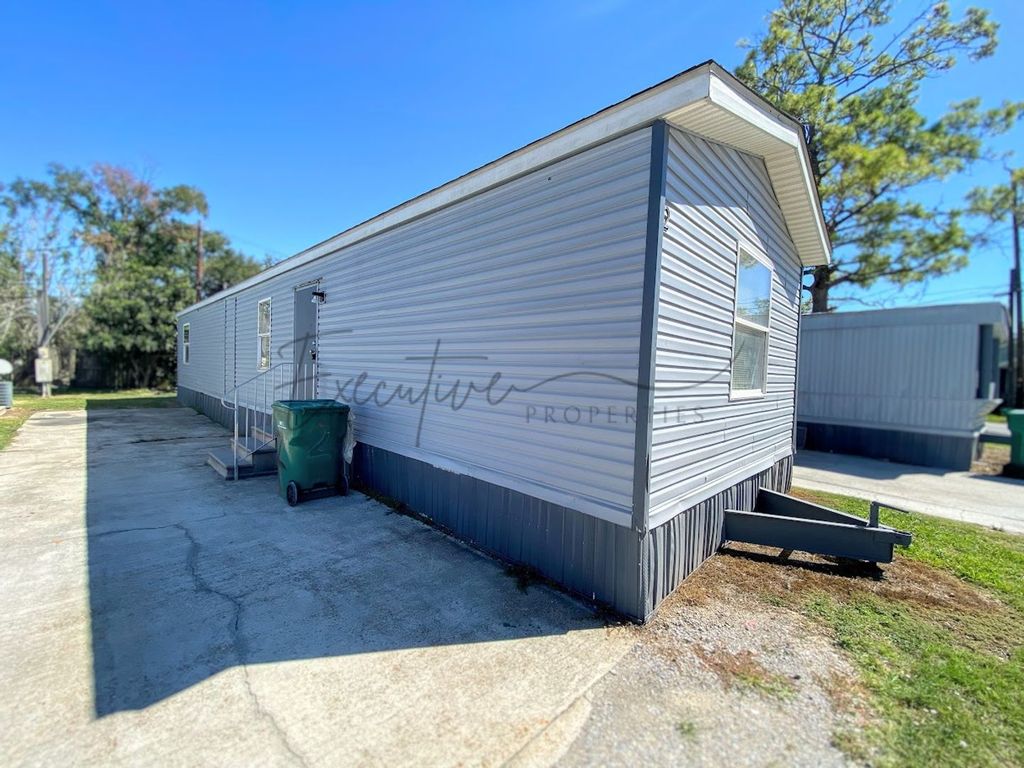 Affordable 1-Bed Mobile Home in Sulphur, LA water, trash, lawn