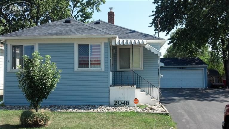 2048 E Schumacher St, Burton, MI 48529 - See Est. Value, Schools & More